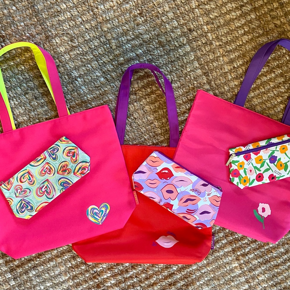 Three new Clinique medium size tote bags with matching makeup bag